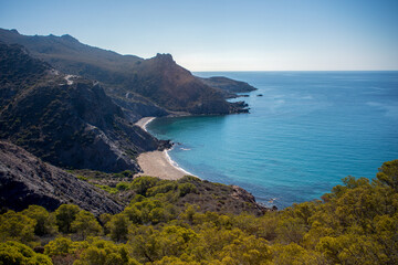 Fototapeta premium View from above of the stunning Fatares beach in Cartagena, Region of Murcia, Spain, in summer