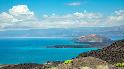 Ardoukoba fissure vents volcano crater cones with gulf and mountains in the background, Tajourah...