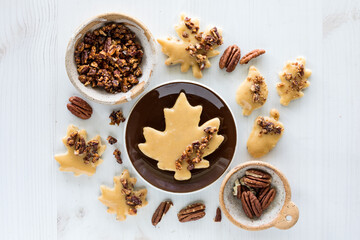 An arrangement of maple pecan shortbread cookies with candied pecans.