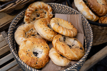 Freshly Baked Traditional Bread Rolls Served in a Charming Rustic Basket for Your Enjoyment and Delight