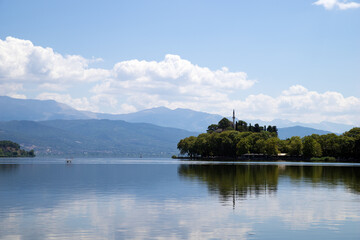 The waterfront of Pamvotida lake in Ioannina, Greece, with the predominant old castle of Ali Pasha in view