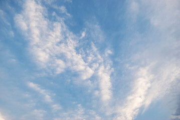 gentle white clouds in the blue sky