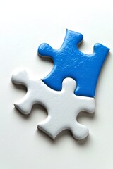 Fototapeta premium Puzzle piece jigsaw symbolizing the final business solution Blue piece represents strategic fit,