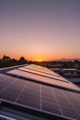 Fototapeta premium Solar panel installation on a residential rooftop at sunset, showcasing photovoltaic cells in neat