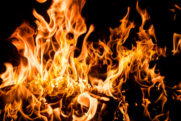 Fire flames on black background. Abstract blaze fire flame texture for banner background. Fire...