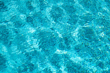 Background of pool water surface. Abstract blue water. Background texture. Water in swimming pool.