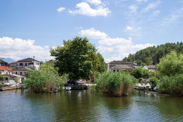 Fototapeta premium The shore of the little island in lake Pamvotida, Ioannina, Greece