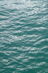 Obraz premium Sea texture. View of ocean waves. Blue water background. Blue ocean water texture background. Surface of the sea.