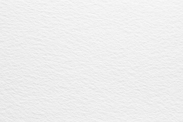 Close-up of seamless white watercolor paper texture background with subtle, natural patterns and a smooth finish. Ideal for creative projects requiring clean, artistic paper surfaces.