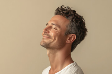 Fototapeta premium A close up of a man's face with her eyes closed