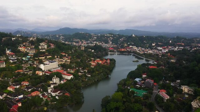 Houses and buildings located on the slopes of the mountains. Kandy city, Sri Lanka.