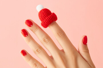 Close up womans hand with red minimalist nail design. Manicure, pedicure beauty salon concept