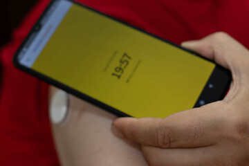 Day in the life of young woman with diabetes working from home