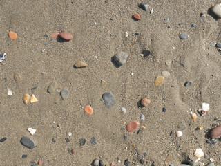 Background of river stone and sand on the beach seashore