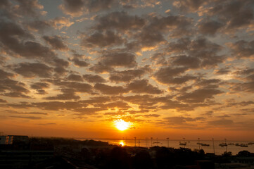 Fototapeta premium Golden sky sunrise dramatic beautiful landscape view. Dawn sky gold dusk time cloudscape with sunlight. Dramatic sunset scenic landscape. Beautiful landscape sunshine nature