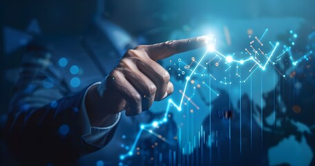 Businessman touching glowing upward arrow on graph line with finger.