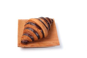 Croissant bread isolated on white background, with chocolate filling