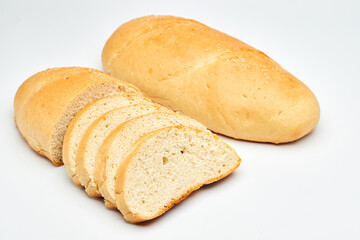 Freshly baked white bread loaf, sliced and ready to serve, perfect for sandwiches and breakfast