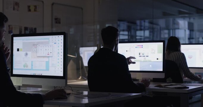 Computer screen, night and graphic designer or digital artist for social media or creative project at marketing agency. People planning on desktop with business software or color tools in dark office