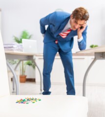 Office prank with sharp thumbtacks on chair