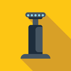 Parking meter emitting light with long shadow on yellow background