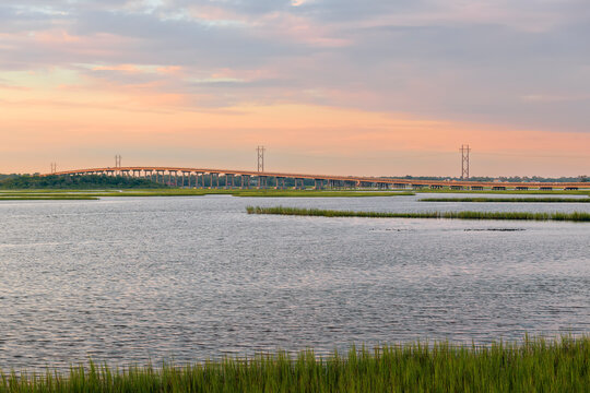 View of Bogue Sound and Emerald isle bridge from the dock at Emerald Isle Woods Park at sunset