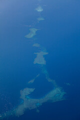 Aerial view over coral reef, Fiji