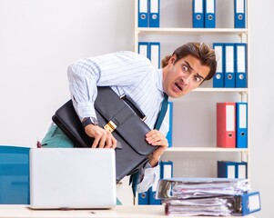 Businessman disgusted with cockroaches in the office