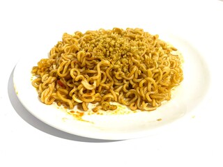 A plate of fried instant ramen noodle or Indonesian Mie Goreng isolated on white background