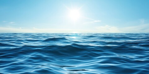 Obraz premium A beautiful view of sea, blue sky wave and sun shine on the water surface making the atmosphere calm and peacful.