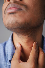 unrecognized man suffering throat pain close up 