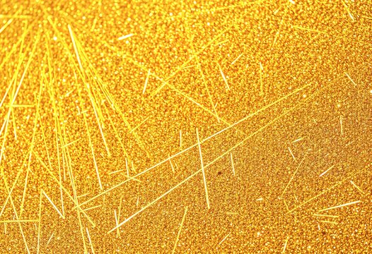 abstract artwork featuring a golden glitter textured background