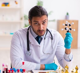 Doctor working in lab in coronavirus COVID-19 concept