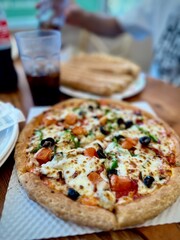 Busan, South Korea - 13 Aug 2024: Veggie Delite Pizza in Papa Johns, Busan with Coke
