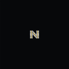 Letter N/Z Logo in Silver and Gold on Black Background: Luxurious and Elegant Design