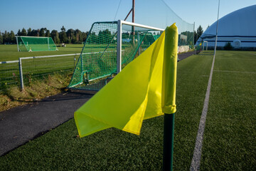 yellow flag on sport field outdoors