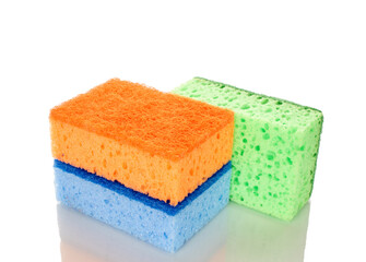 Three kitchen sponges, macro, isolated on white background.