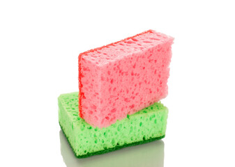 Two kitchen sponges, macro, isolated on white background.