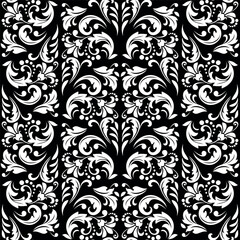 Floral pattern. Vintage wallpaper in the Baroque style. Seamless vector background. White and black ornament for fabric, wallpaper, packaging. Ornate Damask flower ornament.