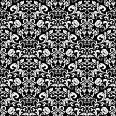 Floral pattern. Vintage wallpaper in the Baroque style. Seamless vector background. White and black ornament for fabric, wallpaper, packaging. Ornate Damask flower ornament.