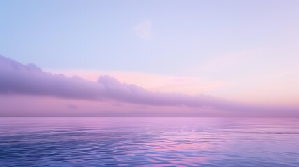 Obraz premium The sky is a soft lavender color, transitioning into a pink hue near the horizon. The water is calm and reflecting the colors of the sky. The sun is just beginning to rise, casting a warm glow on the 