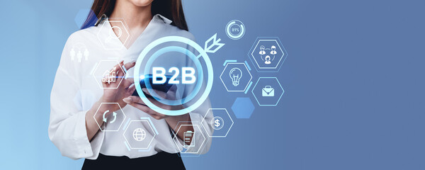 Businesswoman finger touch phone, b2b hologram with business icons