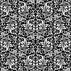 Floral pattern. Vintage wallpaper in the Baroque style. Seamless vector background. White and black ornament for fabric, wallpaper, packaging. Ornate Damask flower ornament.