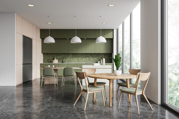 Modern kitchen interior with green cabinets and dining area. 3D Rendering