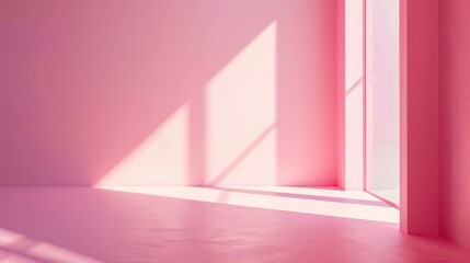 Sunlight streams through a large window in a room with pink walls and flooring. The sunlight casts soft shadows on the walls and floor. The room is empty and the light creates a warm, inviting atmosph