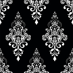 Floral pattern. Vintage wallpaper in the Baroque style. Seamless vector background. White and black ornament for fabric, wallpaper, packaging. Ornate Damask flower ornament.