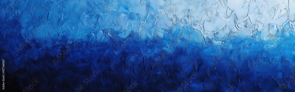 Aufkleber an abstract watercolor painting with a gradient of blue shades from a deep indigo blue at the bottom