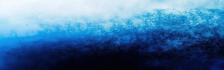 A horizontal image featuring a blue watercolor gradient, transitioning from light to dark. The top of the image is a soft white, transitioning to a vibrant blue, then to a deep navy blue at the bottom