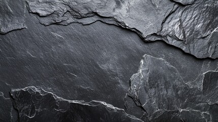 Dark gray slate stone background. Use this for textures, backgrounds, or to create a rustic feel.