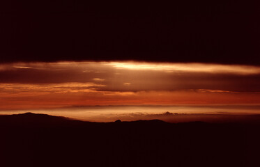 time lapse of clouds over sunset